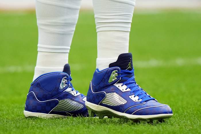 Dallas Cowboys quarterback Dak Prescott's blue and white Air Jordan cleats.